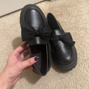 Black Loafers with Bow Detail